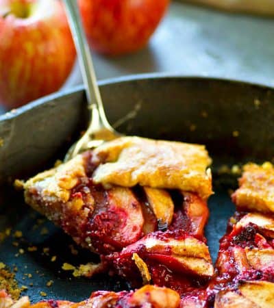 Sweet apples and tangy raspberries are a perfect match in this rustic skillet apple raspberry galette! So easy and impressive to throw together for a last minute dessert.