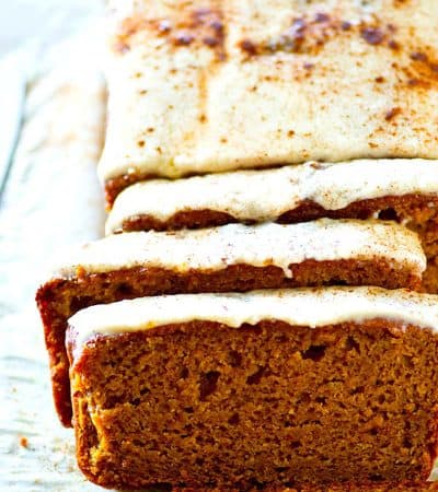 Browned butter in both the frosting and the bread adds SO much rich flavor to this frosted browned butter pumpkin bread! Soon to become your go-to pumpkin bread recipe.