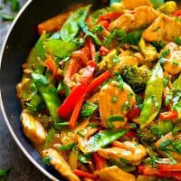 A savory peanut sauce covers every inch of this flavor-packed peanut satay chicken stir-fry! Load it up with all your favorite vegetables and pile it over hot fluffy rice.