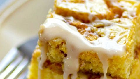 Soft, buttery sheet cake is swirled with a luscious cinnamon roll filling and then drenched in sweet glaze.--this is one addicting cinnamon roll sheet cake!