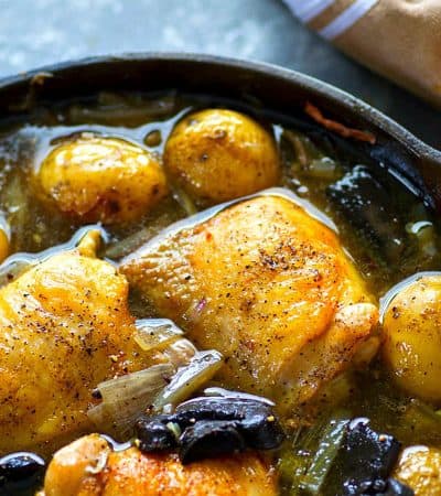 This white wine braised chicken is simple comfort food fancified! Tender chicken thighs are braised in flavorful white wine with lots of tender baby potatoes and mushrooms.