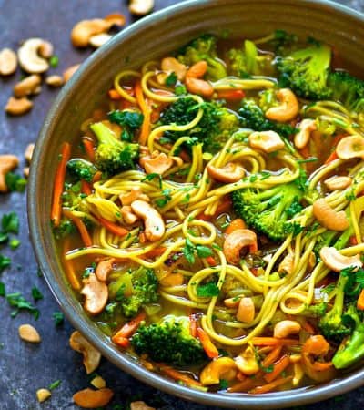 You won't miss the meat whatsoever in these flavor-packed broccoli cashew curry noodle broth bowls! SO full of cozy spring flavors and ready in minutes!