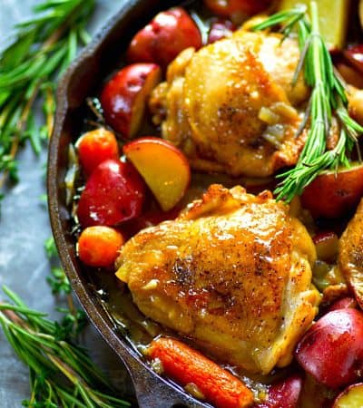 Incredibly juicy chicken is braised in a hearty beer sauce with lots of tender red potatoes and carrots! This beer braised chicken will quickly become a dinner staple.