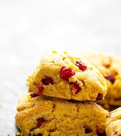 Cranberry Cornmeal Orange Scones - Tangy cranberries and tons of orange flavor take these rustic cranberry scones to the next level! Easy to make for holiday brunch and SO pretty on a brunch table!
