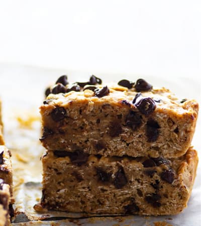 These thick, chewy banana chocolate chip oatmeal breakfast bars are the best way to start the day! Make them way ahead of time or freeze them for an easy grab 'n' go breakfast.