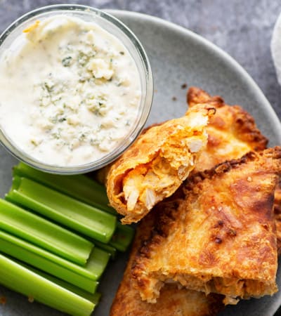 Crispy buffalo chicken empanadas are made entirely in the air fryer in MINUTES and stuffed with a spicy buffalo chicken filling. Serve these flaky empanadas with plenty of blue cheese dressing and celery sticks!