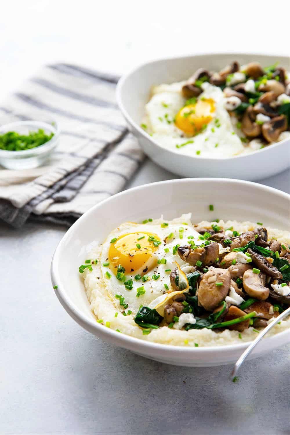 Goat Cheese Grits with Garlic Butter Mushrooms and Spinach