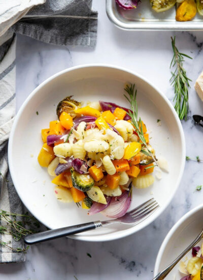 Sheet pan gnocchi is roasted with hearty fall vegetables entirely on one sheet pan in less than hour for an easy weeknight dinner with little to no cleanup!