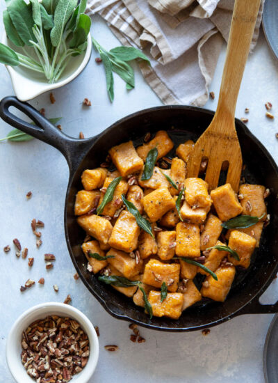 Sweet potato gnocchi is incredibly easy to make at home and perfectly light and fluffy! Toss this gnocchi with a sweet maple butter sauce and lots of crispy sage.
