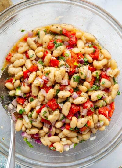 Loaded with tender white beans and roasted red peppers in a flavorful miso dressing, this white bean salad is the perfect salad side dish for any gathering!