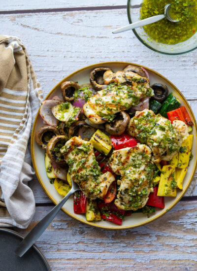Marinated in a flavorful homemade chimichurri sauce, this grilled chimichurri chicken and vegetables is the perfect summery dinner to throw on the grill!