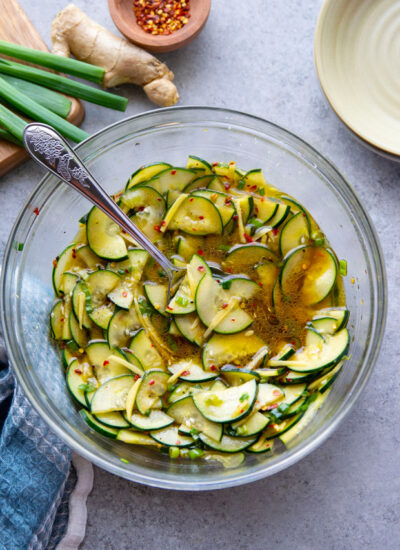 Marinated in a spicy ginger dressing and packed with crisp cucumbers, this cucumber ginger salad is a fast summer salad to pull off and perfect for an abundance of cucumbers!