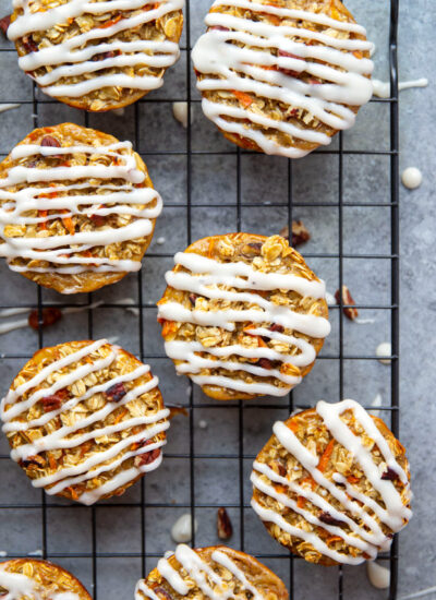 Packed with all the best parts of a classic carrot cake, these carrot cake baked oatmeal cups are an easy, filling breakfast and the prettiest addition to any brunch!