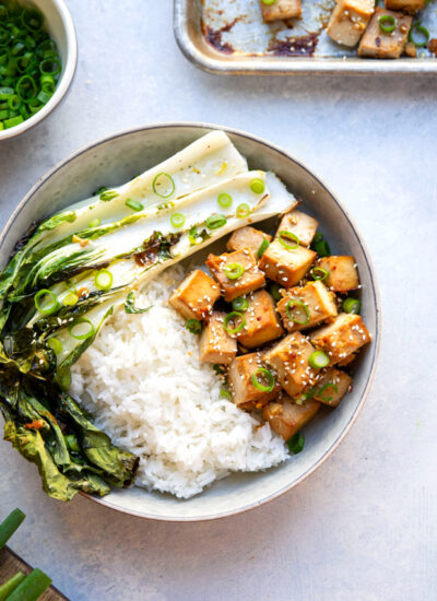 This miso baked tofu features tofu cubes marinated in a flavorful miso sauce and roasted alongside tender bok choy on one sheet pan. Serve this tofu and bok choy over hot rice with lots of sesame seeds and scallions!