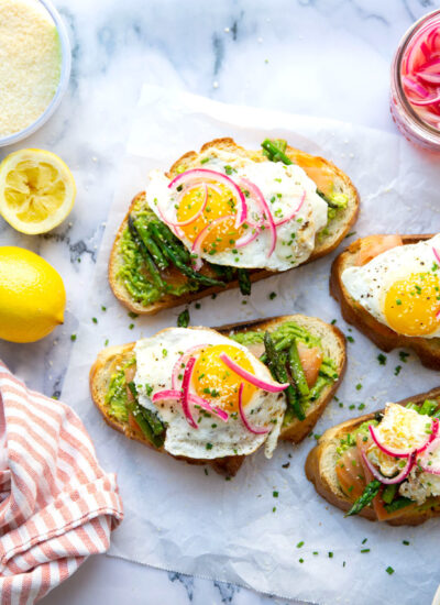 Flavorful smoked salmon, creamy avocado, and tender asparagus join forces in this smoked salmon avocado toast that's both impressive and quick to make!