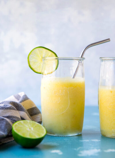 You'll feel like you took a trip to the tropics after one sip of these refreshing pineapple margarita slushies that take only 6 ingredients and 10 minutes to make!