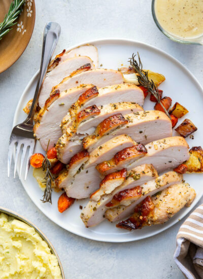 This dry brined turkey breast is incredibly tender and juicy from a flavorful dry brine and the perfect way to serve turkey for a smaller crowd! Serve with your favorite side dishes and lots of flavorful apple cider gravy on top.
