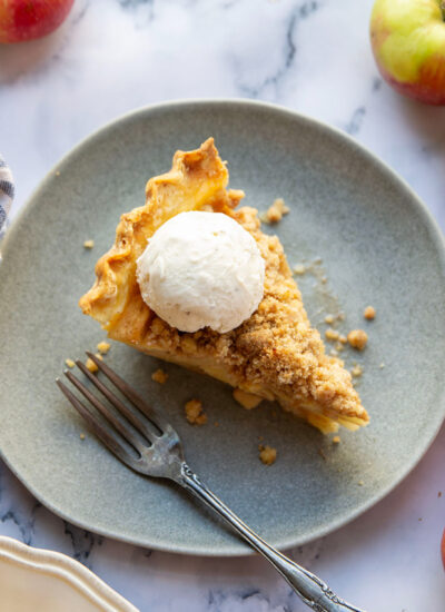 This is the best Dutch apple pie you'll ever make! The apples are full of warm fall spices (with a secret ingredient!) and topped with tons of buttery cinnamon streusel.