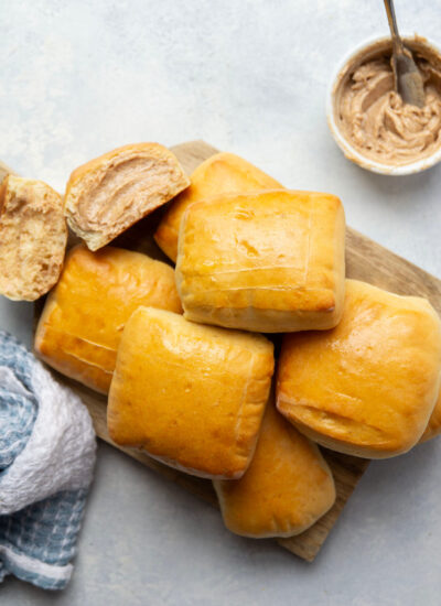 These Texas Roadhouse yeast rolls feature an incredibly soft and fluffy texture and are amazing warm from the oven with a schmear of sweet cinnamon butter!