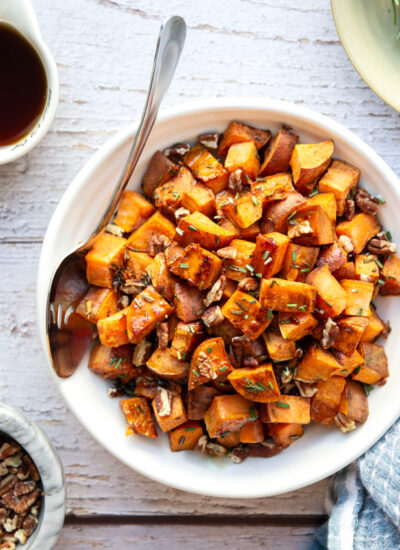 Fragrant rosemary and sweet maple syrup are the perfect combo in these tender rosemary roasted sweet potatoes! They come together in minutes and go well with a variety of dishes.