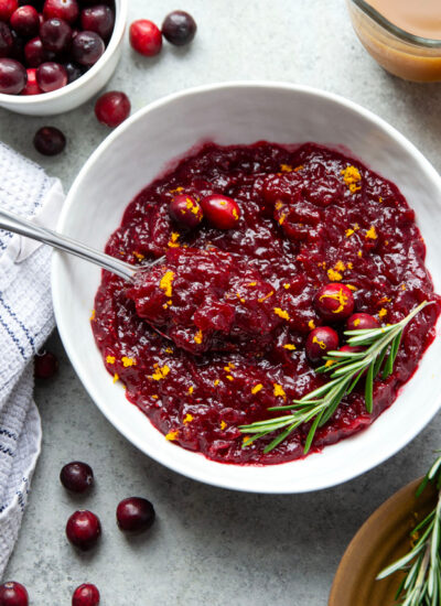 Perfectly sweet and tangy, my mom's fresh cranberry sauce recipe is an essential side dish for any Thanksgiving table. It's so simple to make you'll never go back to the canned stuff again!