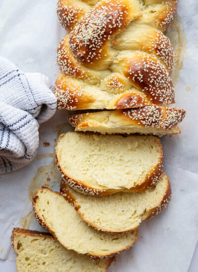 This traditional challah bread features a simple enriched yeast dough twisted into a stunning braid and baked until perfectly soft and chewy.