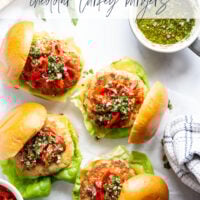 Topped with tender roasted red peppers and a flavorful chimichurri sauce, these cheddar turkey burgers are the perfect summer sandwich.