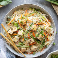Loaded with a rainbow of fresh veggies and flavorful sweet chili tofu, this vermicelli noodle salad is massively flavorful and goes well with a variety of dishes.