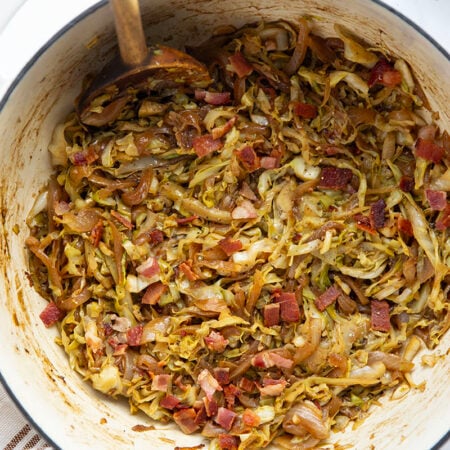 Deeply flavorful caramelized onion and crispy bacon pair perfectly with tender cabbage in this easy bacon fried cabbage. Try pairing it with corned beef and potatoes for a full hearty meal.