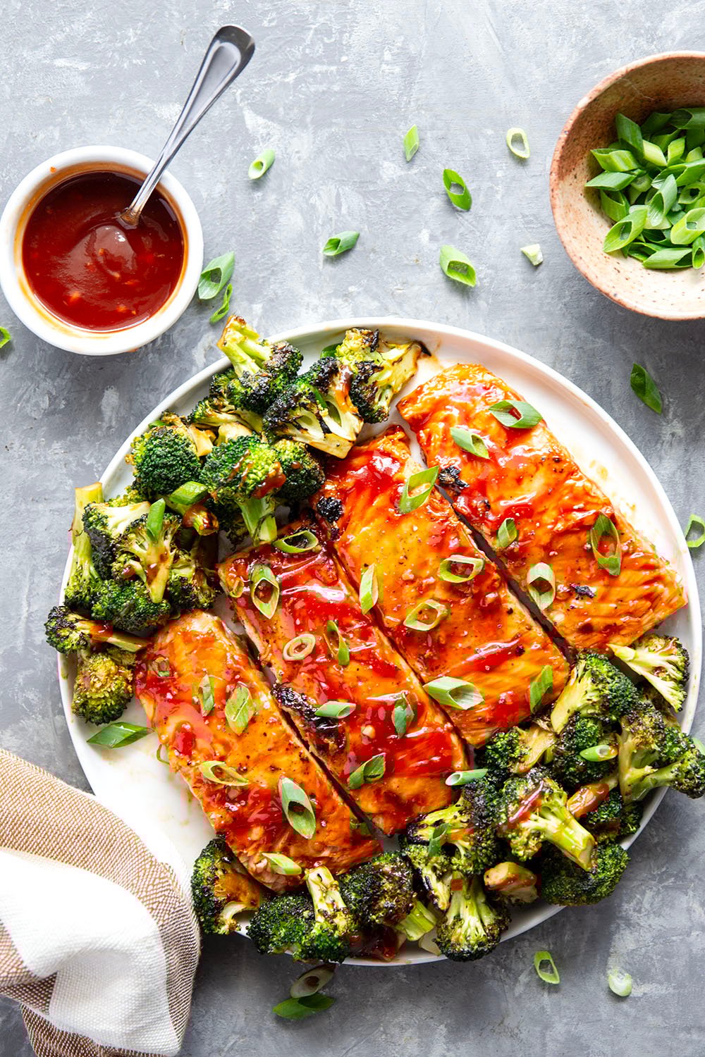 Brushed in a sweet homemade barbecue sauce and grilled alongside broccoli, this grilled BBQ salmon is ready in only 30 minutes and great served alongside steamed rice.