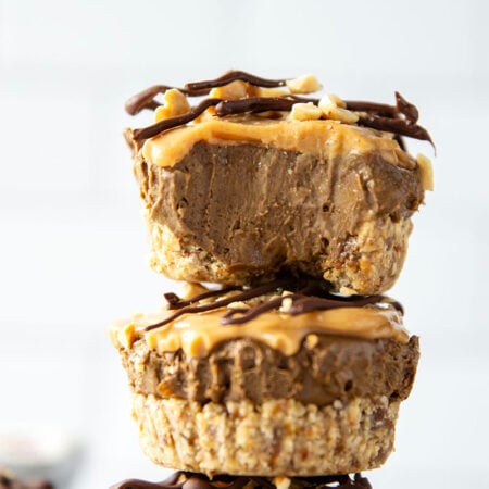 Packed with 12 grams protein per serving, these frozen chocolate mousse cups feature a tender oat crust, silky chocolate mousse filling, and a crunchy peanut butter magic shell on top.
