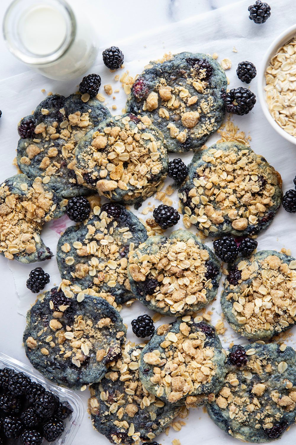 Baked with juicy blackberries inside and topped with a buttery oatmeal streusel, these streusel blackberry cookies are like a blackberry crisp in cookie form!