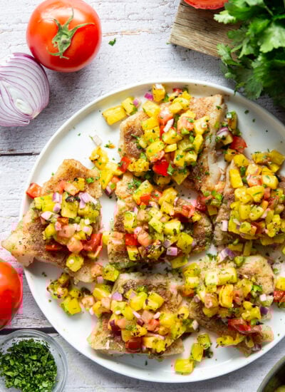 This jerk cod features a homemade jerk seasoning mix rubbed all over cod fillets, grilled to perfection, and topped with a smoky grilled pineapple salsa.