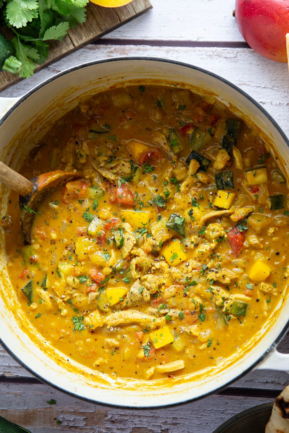 This mango chicken curry features tender chicken and lots of zucchini simmered in a flavorful fresh mango coconut curry sauce.