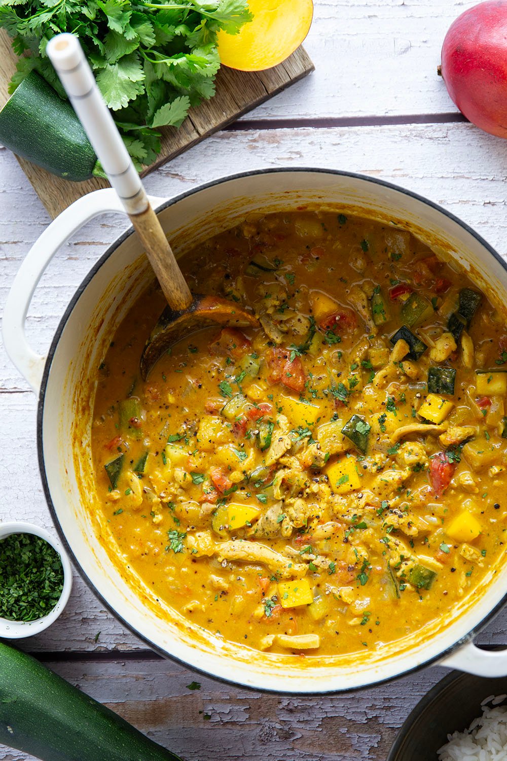 This mango chicken curry features tender chicken and lots of zucchini simmered in a flavorful fresh mango coconut curry sauce.