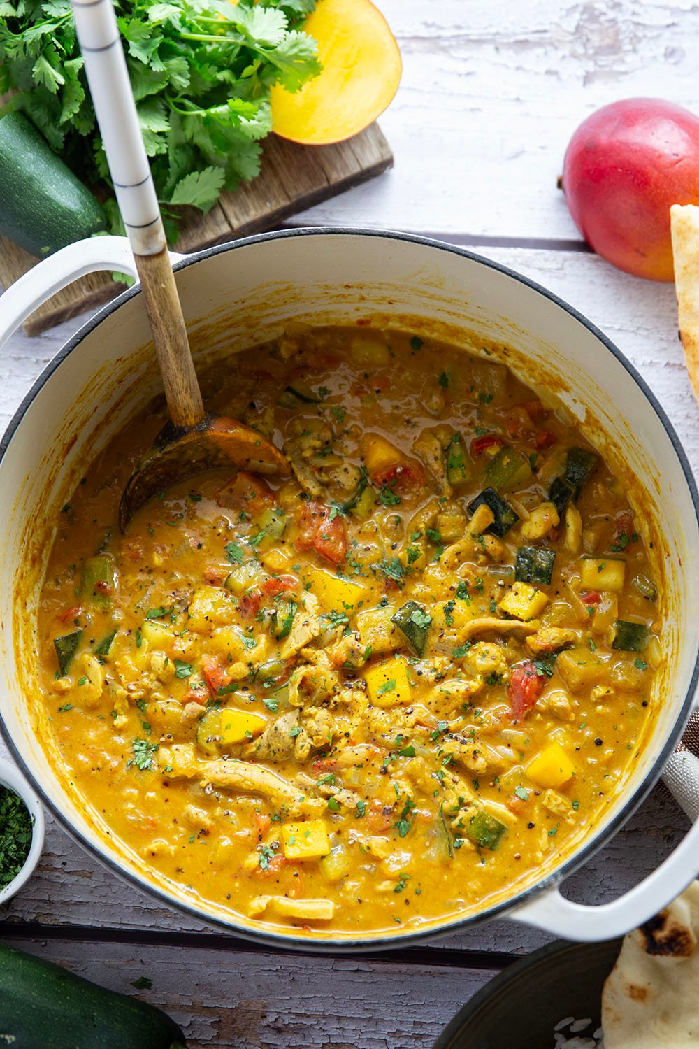 This mango chicken curry features tender chicken and lots of zucchini simmered in a flavorful fresh mango coconut curry sauce.