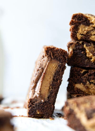 Swirled with creamy peanut butter and topped with lots of peanut butter cups, these fudgy peanut butter swirl brownies are the ultimate dessert for any peanut butter lover!