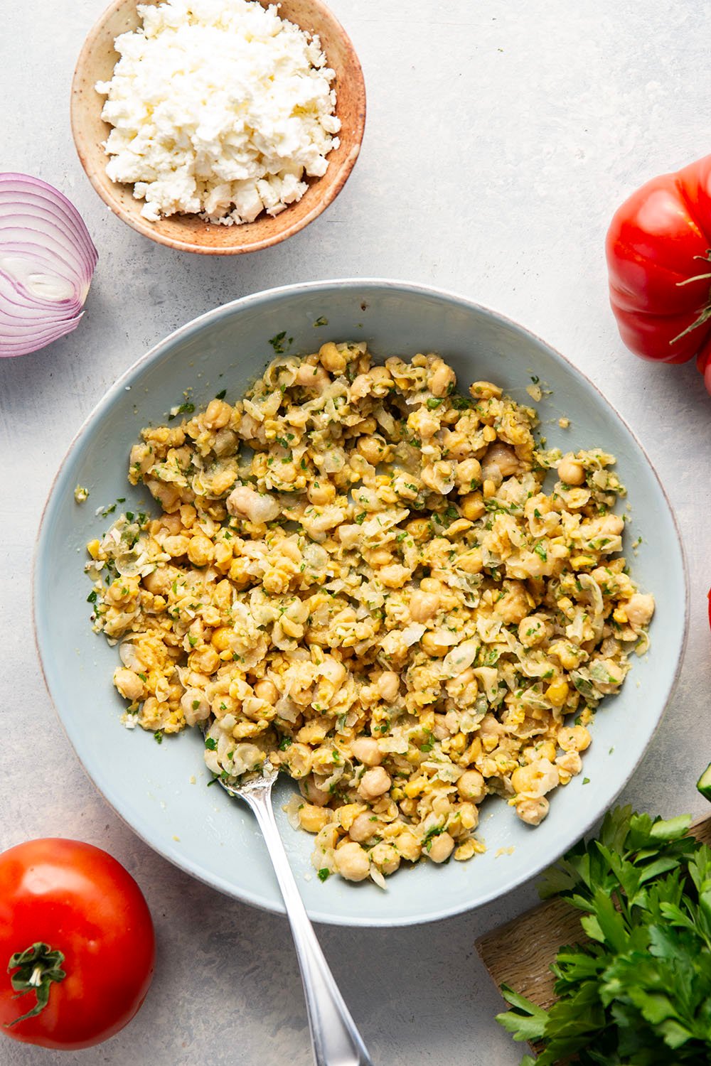 Lemony herb smashed chickpeas and lots of fresh Mediterranean ingredients make for the best lunch in this Mediterranean chickpea wrap.