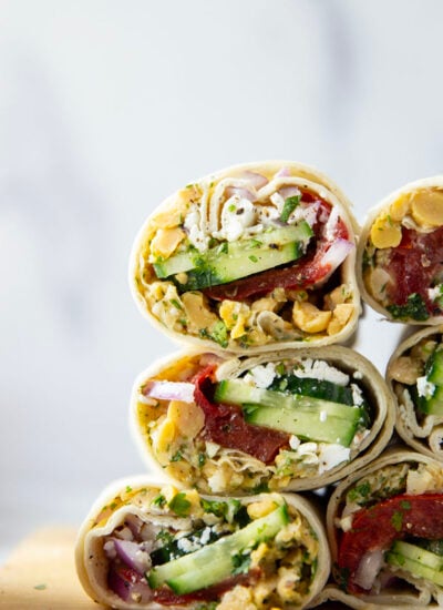 Lemony herb smashed chickpeas and lots of fresh Mediterranean ingredients make for the best lunch in this Mediterranean chickpea wrap.