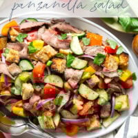 Juicy grilled steak, charred bread cubes, juicy tomatoes, and lots of fresh basil make for the perfect summery meal in this grilled steak panzanella salad.
