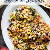 Marinated in a flavorful tahini sauce, grilled to smoky perfection, and topped with a tangy peach feta salsa, this grilled tahini chicken is an explosion of flavors!