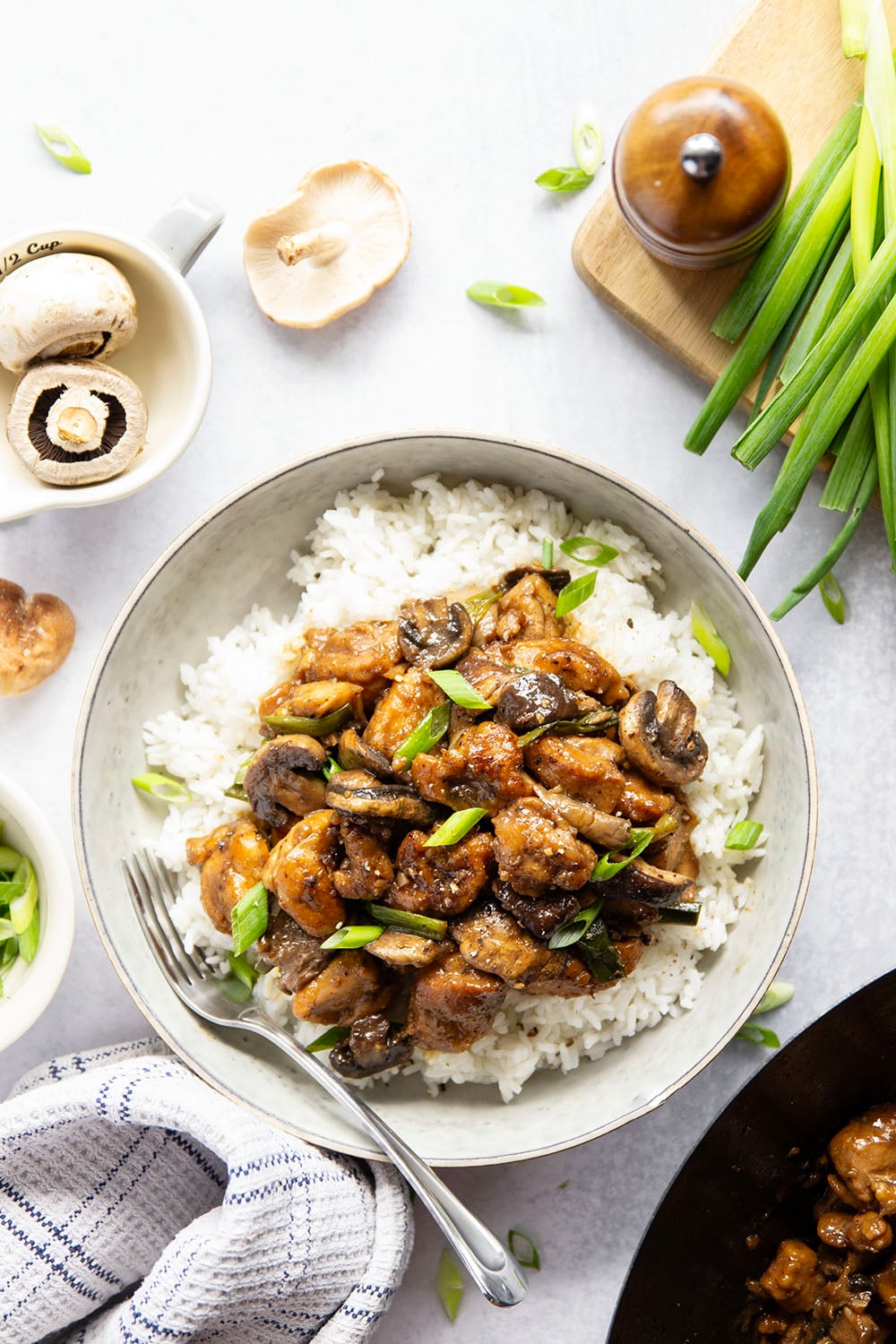 This mushroom chicken stir fry features tender sautéed mushrooms and golden pan-fried chicken cubes tossed in a savory black pepper stir fry sauce.
