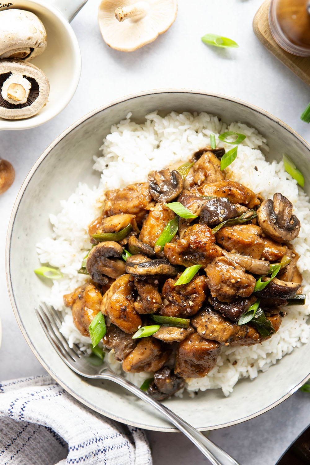 This mushroom chicken stir fry features tender sautéed mushrooms and golden pan-fried chicken cubes tossed in a savory black pepper stir fry sauce.