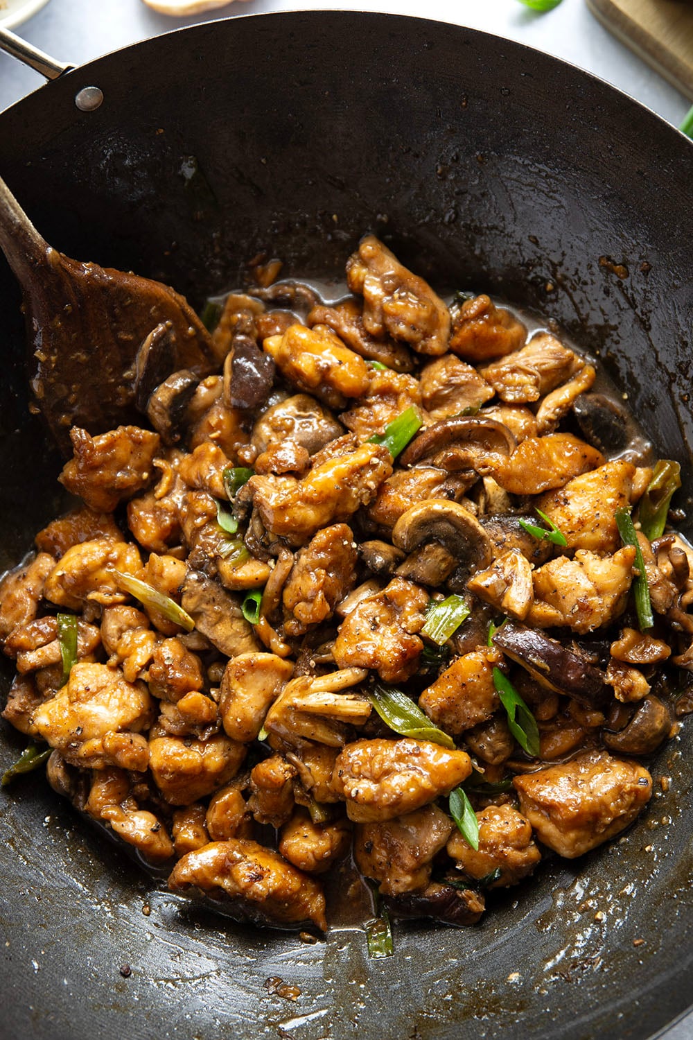 This mushroom chicken stir fry features tender sautéed mushrooms and golden pan-fried chicken cubes tossed in a savory black pepper stir fry sauce.