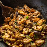This mushroom chicken stir fry features tender sautéed mushrooms and golden pan-fried chicken cubes tossed in a savory black pepper stir fry sauce.