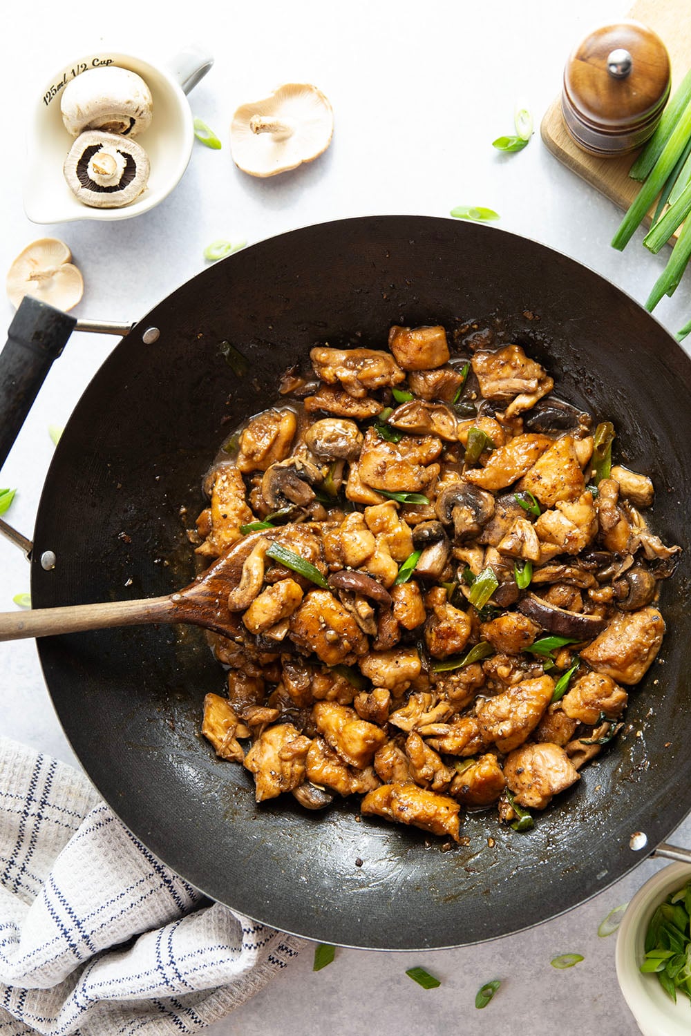 This mushroom chicken stir fry features tender sautéed mushrooms and golden pan-fried chicken cubes tossed in a savory black pepper stir fry sauce.