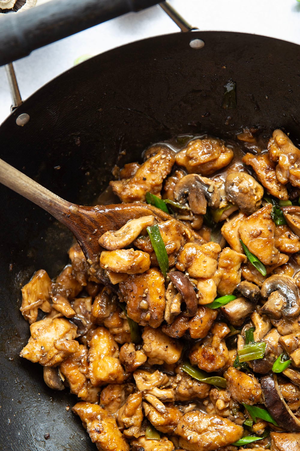 This mushroom chicken stir fry features tender sautéed mushrooms and golden pan-fried chicken cubes tossed in a savory black pepper stir fry sauce.