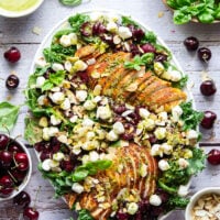 Roasted cherries, juicy spice-rubbed chicken, and a fresh and flavorful basil lemon dressing make for a dream summer salad in this showstopper cherry chicken salad!