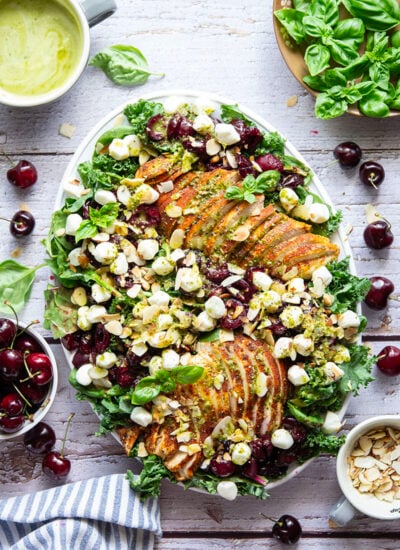 Roasted cherries, juicy spice-rubbed chicken, and a fresh and flavorful basil lemon dressing make for a dream summer salad in this showstopper cherry chicken salad!