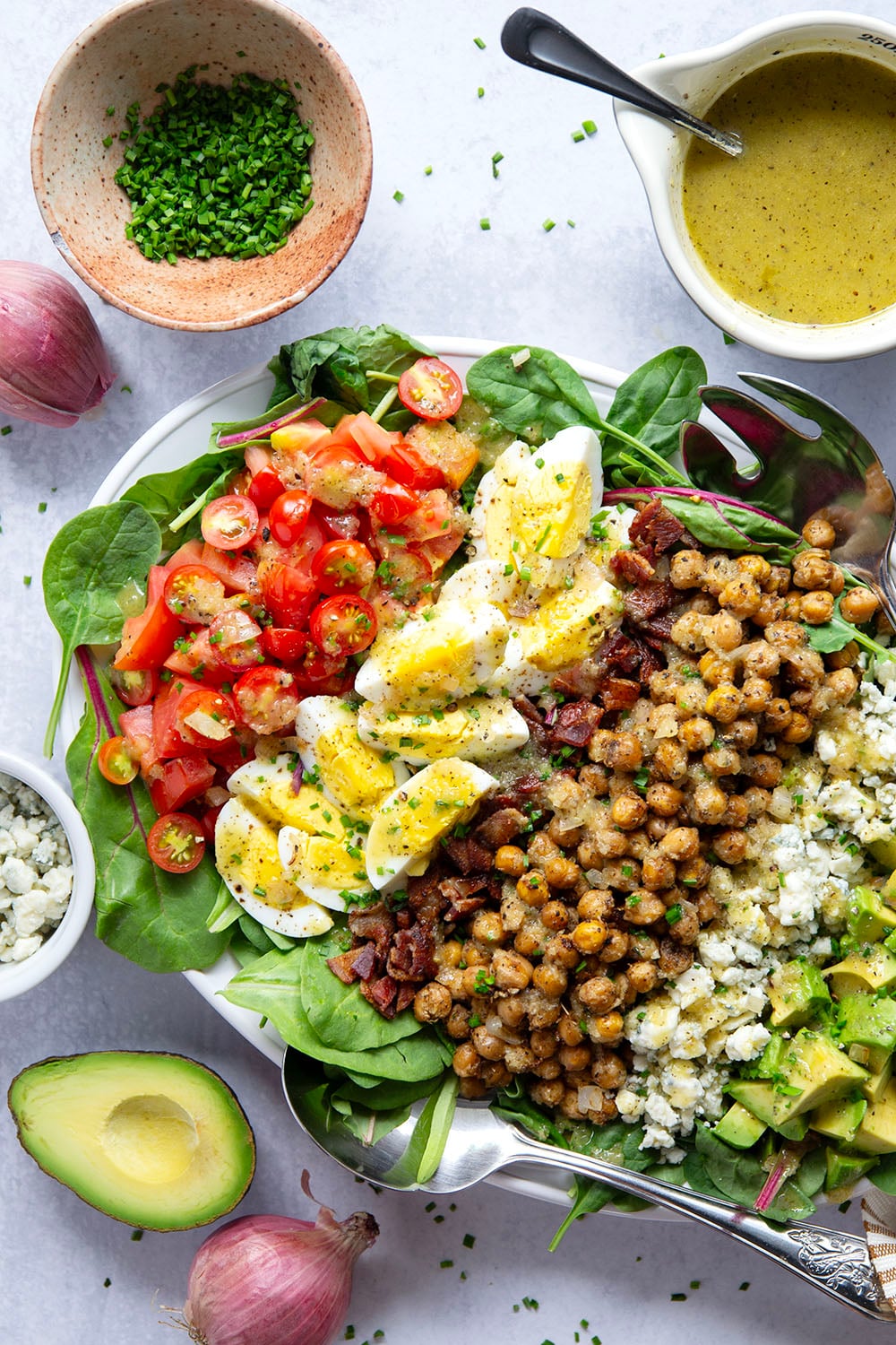 Crispy roasted chickpeas and a flavorful sautéed shallot dressing take this chickpea cobb salad to the next level!